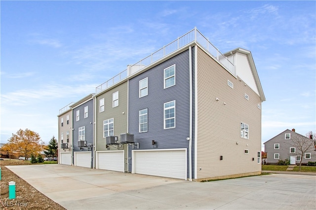 view of property exterior with a garage