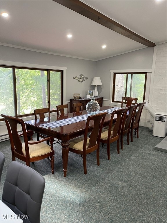 carpeted dining space featuring vaulted ceiling with beams and crown molding