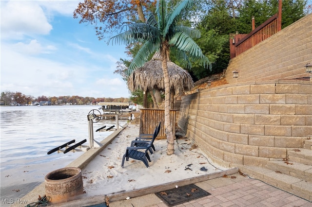 dock area with a water view