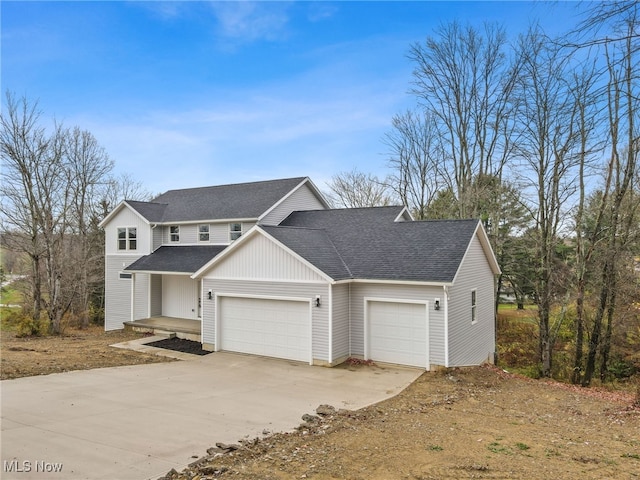 view of front of property featuring a garage