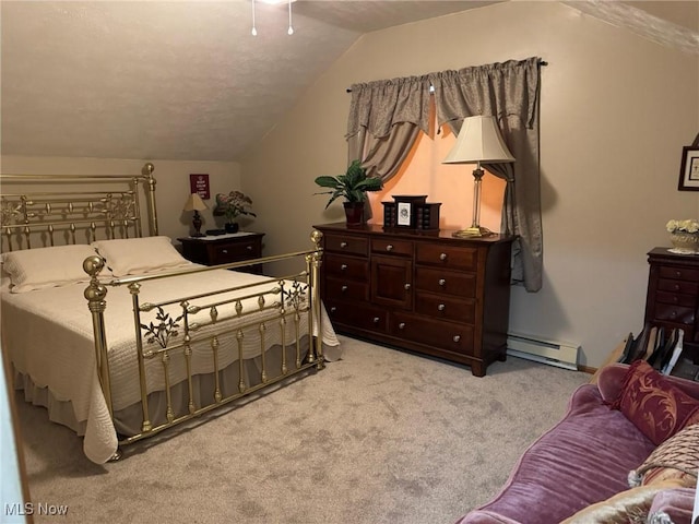 carpeted bedroom with a baseboard radiator and vaulted ceiling