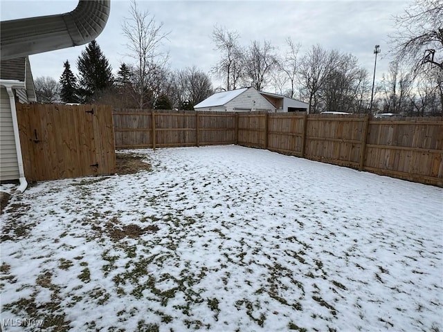 view of yard covered in snow