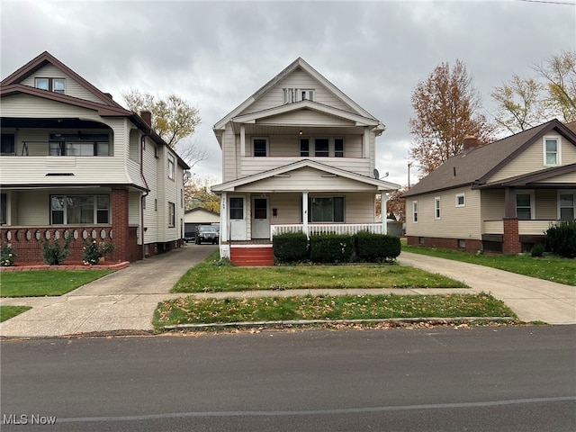 view of front of house featuring a front lawn and a porch