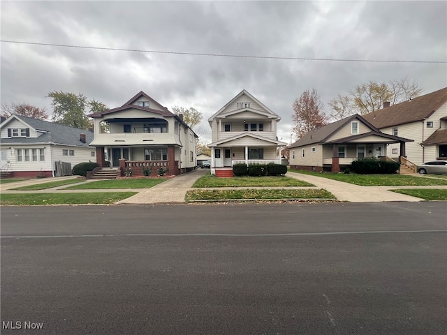 view of front of home featuring a porch and a front yard