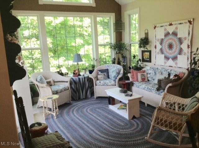 sunroom / solarium featuring a wealth of natural light