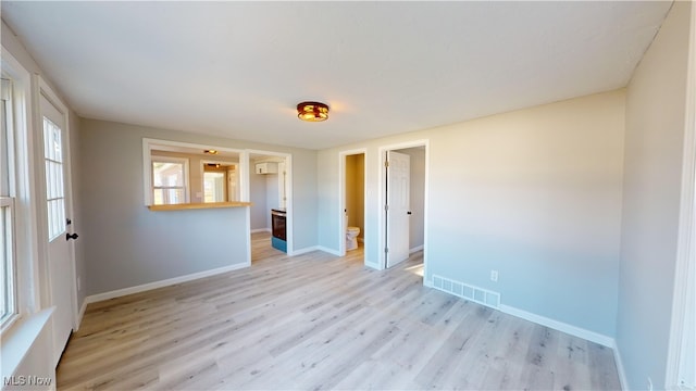 empty room with light wood-type flooring