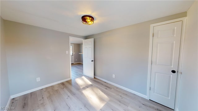 unfurnished bedroom with light hardwood / wood-style floors