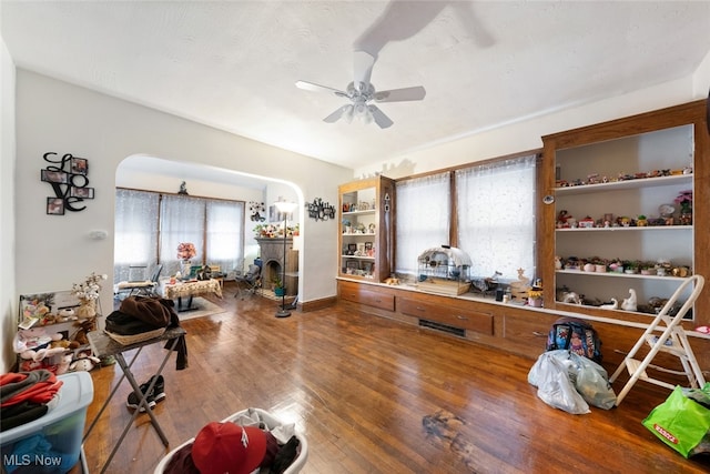 interior space with hardwood / wood-style flooring, a healthy amount of sunlight, and ceiling fan