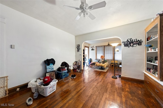 interior space featuring hardwood / wood-style floors and ceiling fan