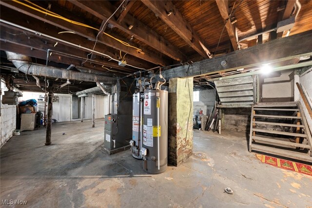 basement featuring water heater and heating unit