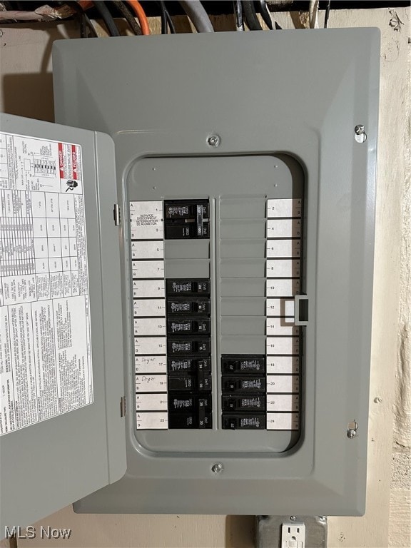 utility room featuring electric panel