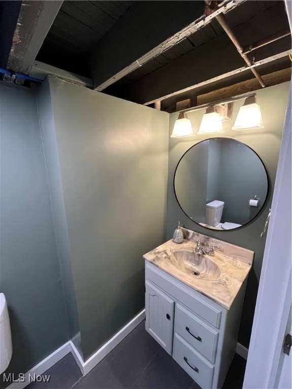 bathroom with vanity and toilet