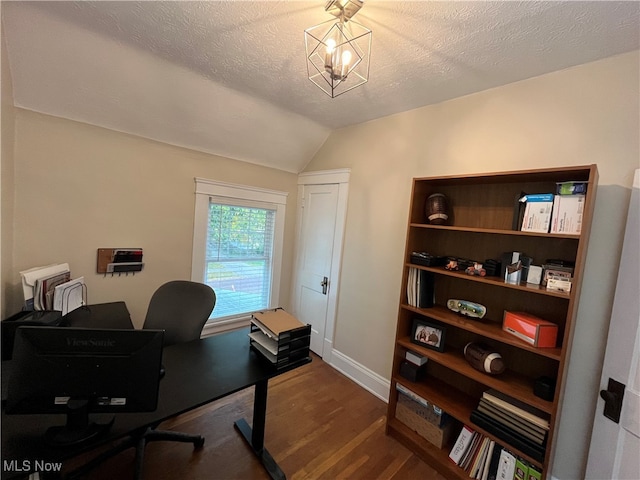 office space featuring hardwood / wood-style floors, a chandelier, a textured ceiling, and lofted ceiling