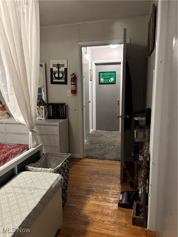 corridor with dark wood-type flooring