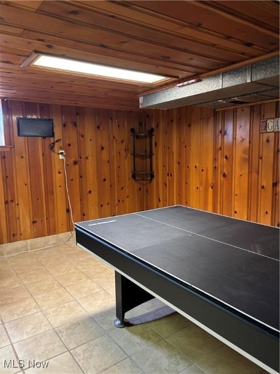 57365 Washington Blvd, Martins Ferry, OH 43935 - recreation room featuring wood ceiling, wooden walls, and tile patterned flooring
