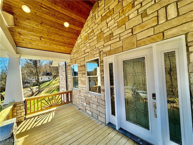 wooden deck with a porch