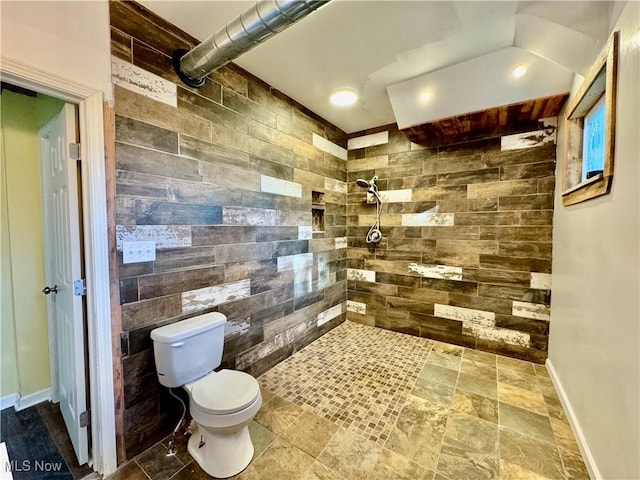 bathroom with toilet and walk in shower