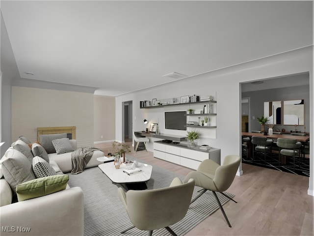 living room with light hardwood / wood-style floors