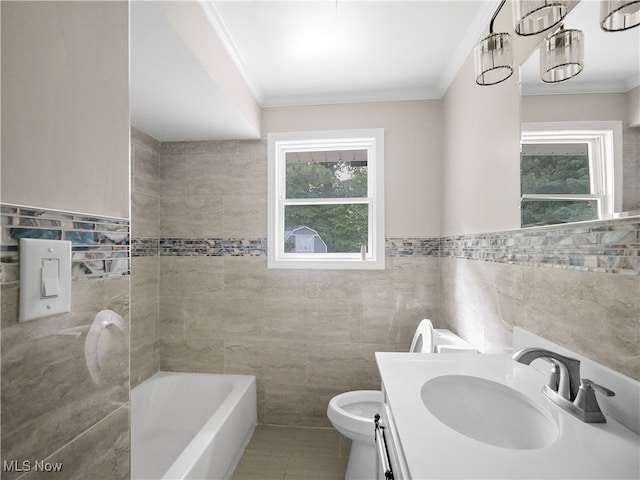 bathroom featuring a bath, tile patterned floors, tile walls, and ornamental molding