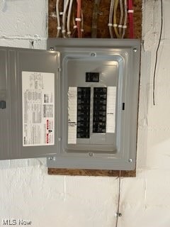 utility room featuring electric panel