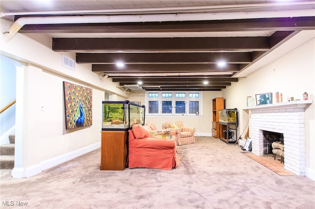 carpeted living room with beam ceiling and a fireplace