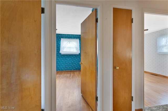 corridor featuring light wood-type flooring