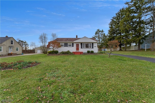 ranch-style house with a front yard