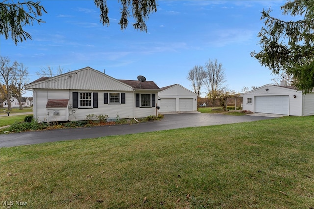 ranch-style home with a front yard and a garage