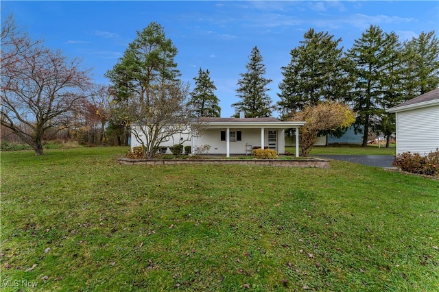 view of front of house featuring a front lawn and a porch