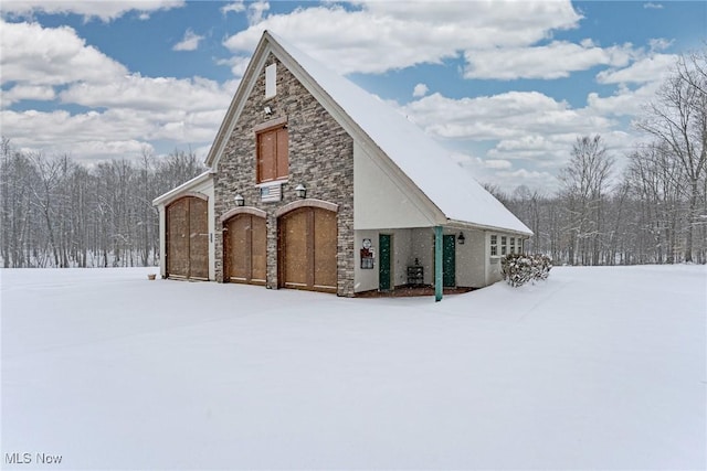 view of snow covered property