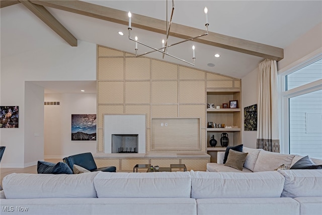 living room featuring built in features, a fireplace, high vaulted ceiling, and beam ceiling