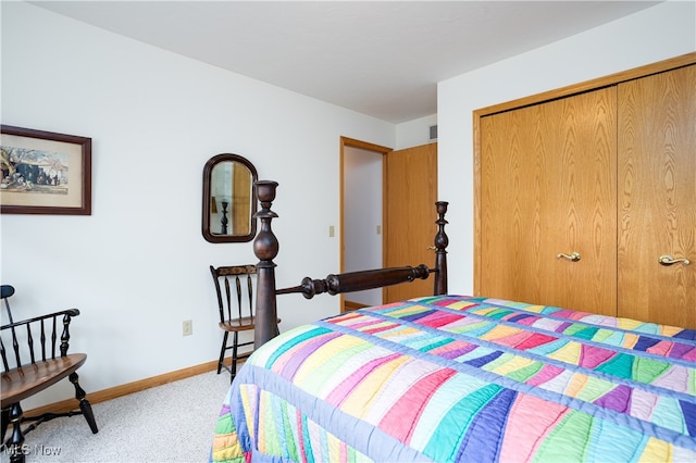 carpeted bedroom with a closet