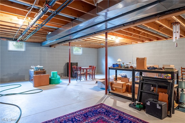 basement featuring plenty of natural light