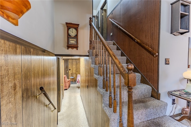 stairway with carpet floors