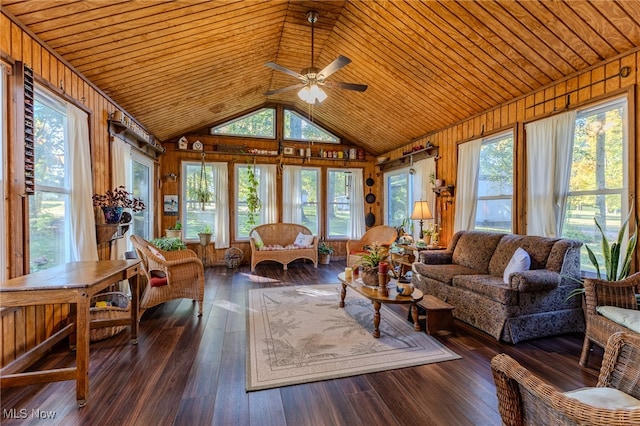 sunroom / solarium with ceiling fan, wood ceiling, and vaulted ceiling