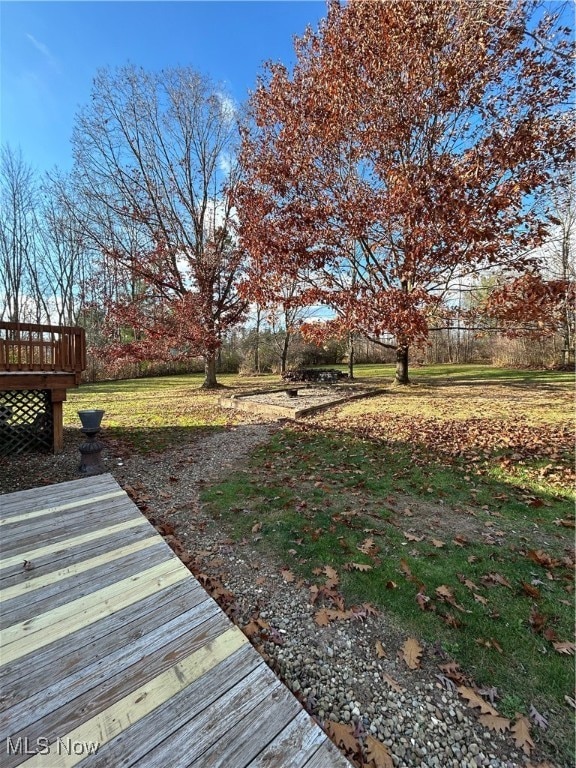 view of yard featuring a deck