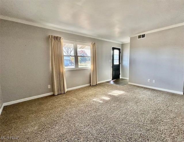 carpeted empty room with crown molding