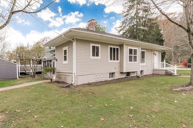 exterior space featuring a front yard