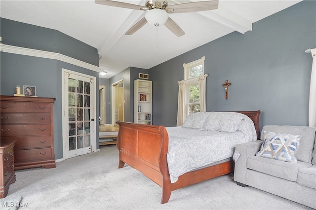 carpeted bedroom featuring ceiling fan and beam ceiling