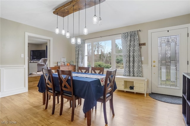 dining room with light hardwood / wood-style floors