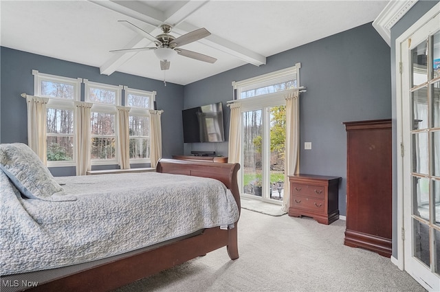 bedroom with beam ceiling, light carpet, ceiling fan, and access to exterior