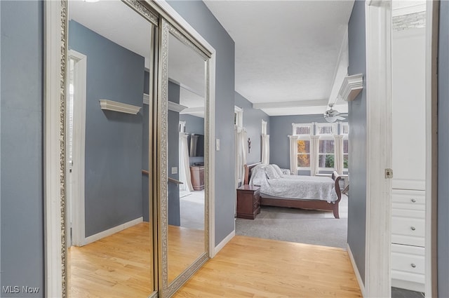 hallway featuring hardwood / wood-style flooring