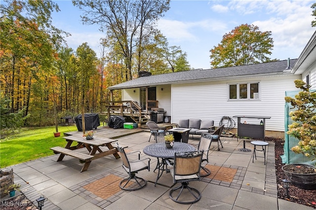 view of patio / terrace featuring a deck and an outdoor living space