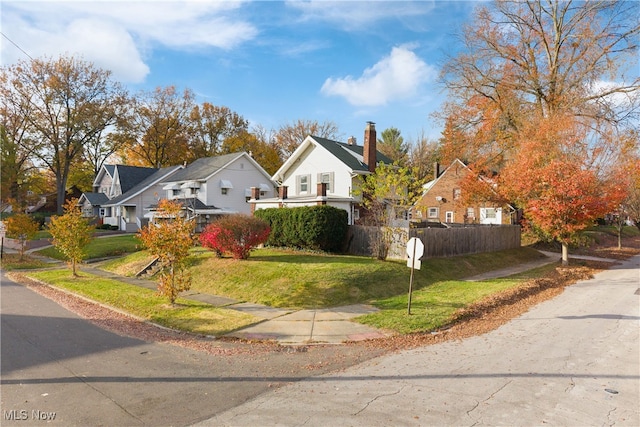 view of front of property with a front lawn