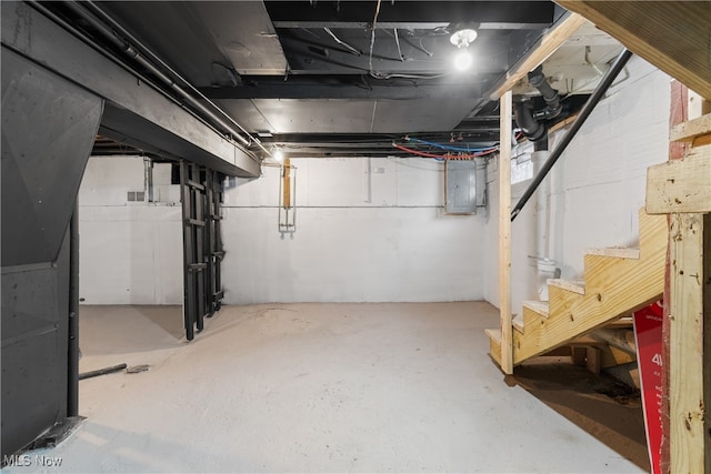 basement featuring electric panel