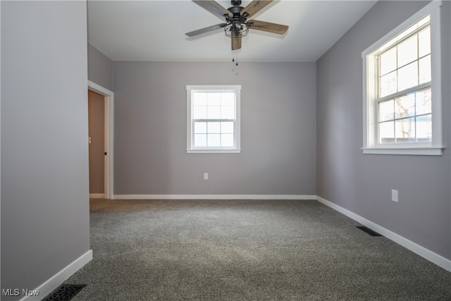 carpeted empty room with ceiling fan