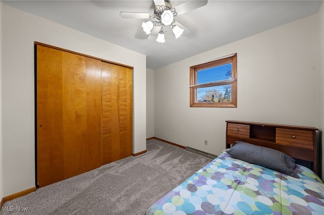 bedroom with a closet, carpet, and ceiling fan