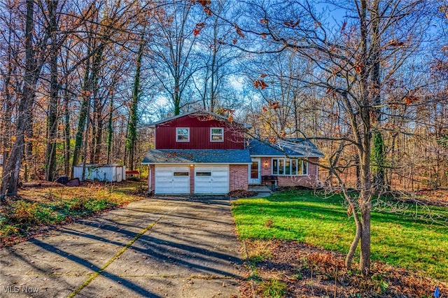 split level home with a garage and a front yard