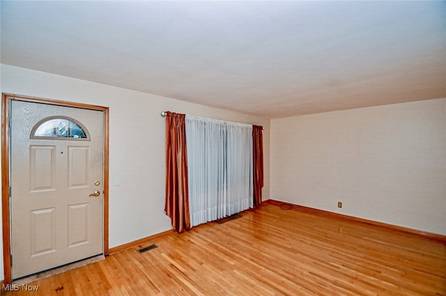 entrance foyer with light hardwood / wood-style floors