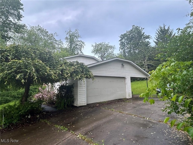 139 Melinda Dr, Wintersville, OH 43953 - garage featuring concrete driveway